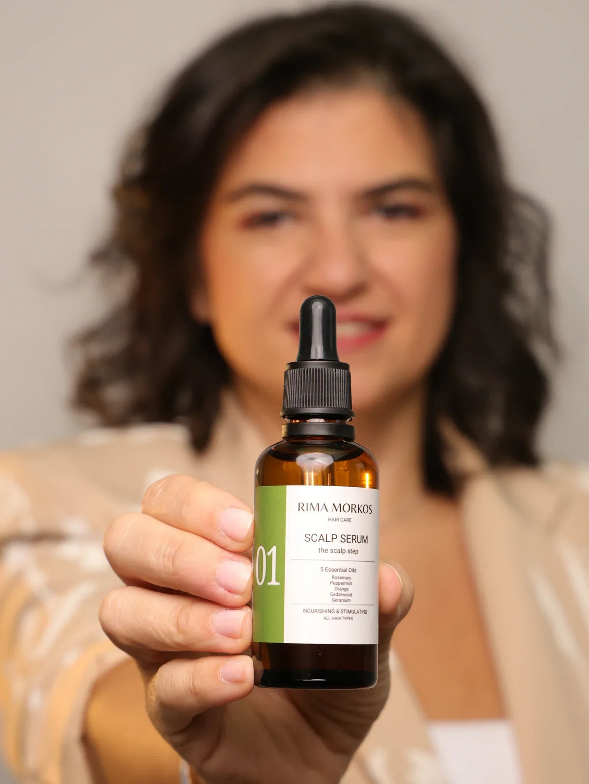 Rima Morkos holding No 01 Scalp Serum