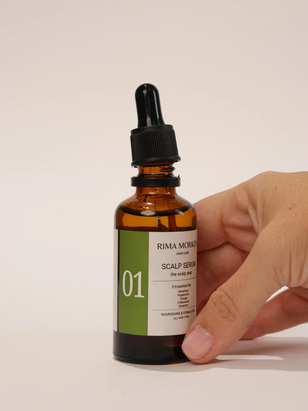 No 01 Scalp Serum in hand